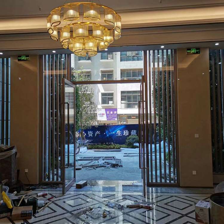 酒店大堂森堡尼门窗钛金双开门地弹门安装