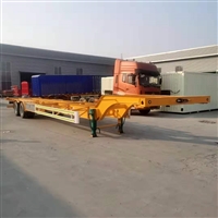  上海宝钢材质 骨架式平板半挂车 集装箱运输拖板车价格