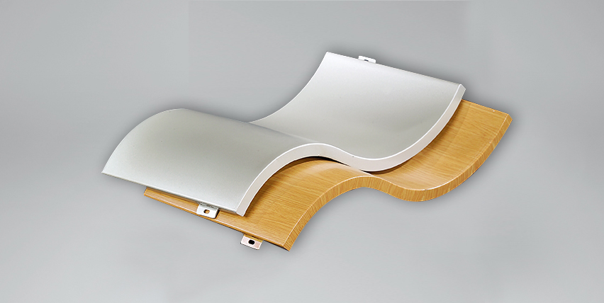 双曲铝单板:以高等级铝合金为主要材料,经过裁剪,折边,弯弧,焊接,加筋