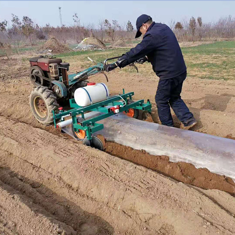 烤烟药材种植牵引式地膜机手扶车带的地膜机宽窄可调的扣膜机