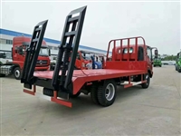 拉萨平板运输车厂家  西藏平板运输车价格 10吨挖掘机运输车图片
