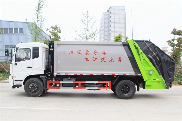 天锦8吨压缩垃圾车图片（车头向左正侧）
