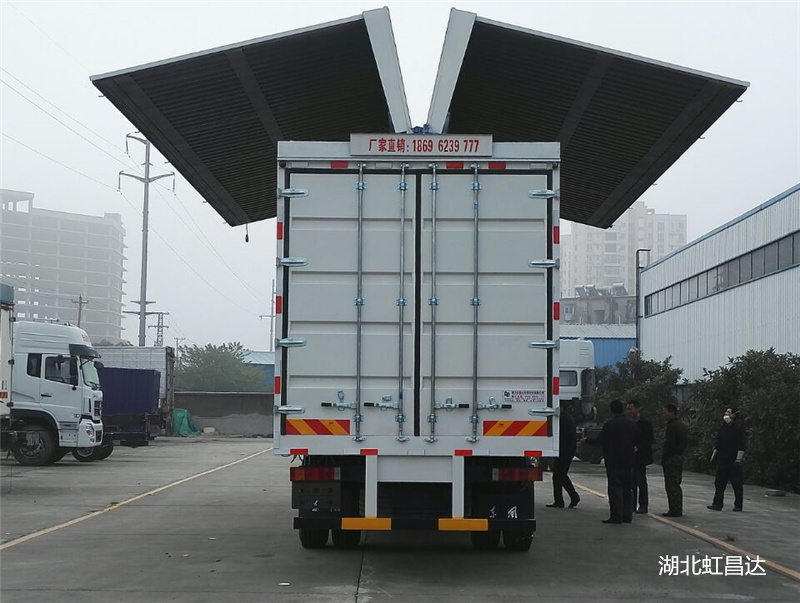 东风天龙9米6物流专用展翼车改装厂家,9.6米飞翼厢车