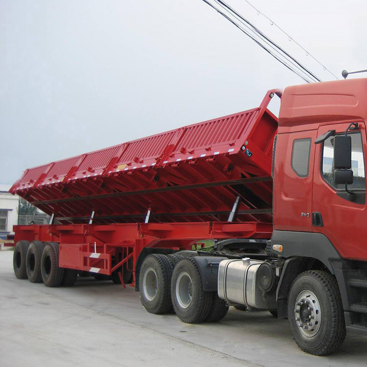 整体封闭式侧翻自卸半挂车3桥60吨侧翻自卸半挂车磊信达实地试车