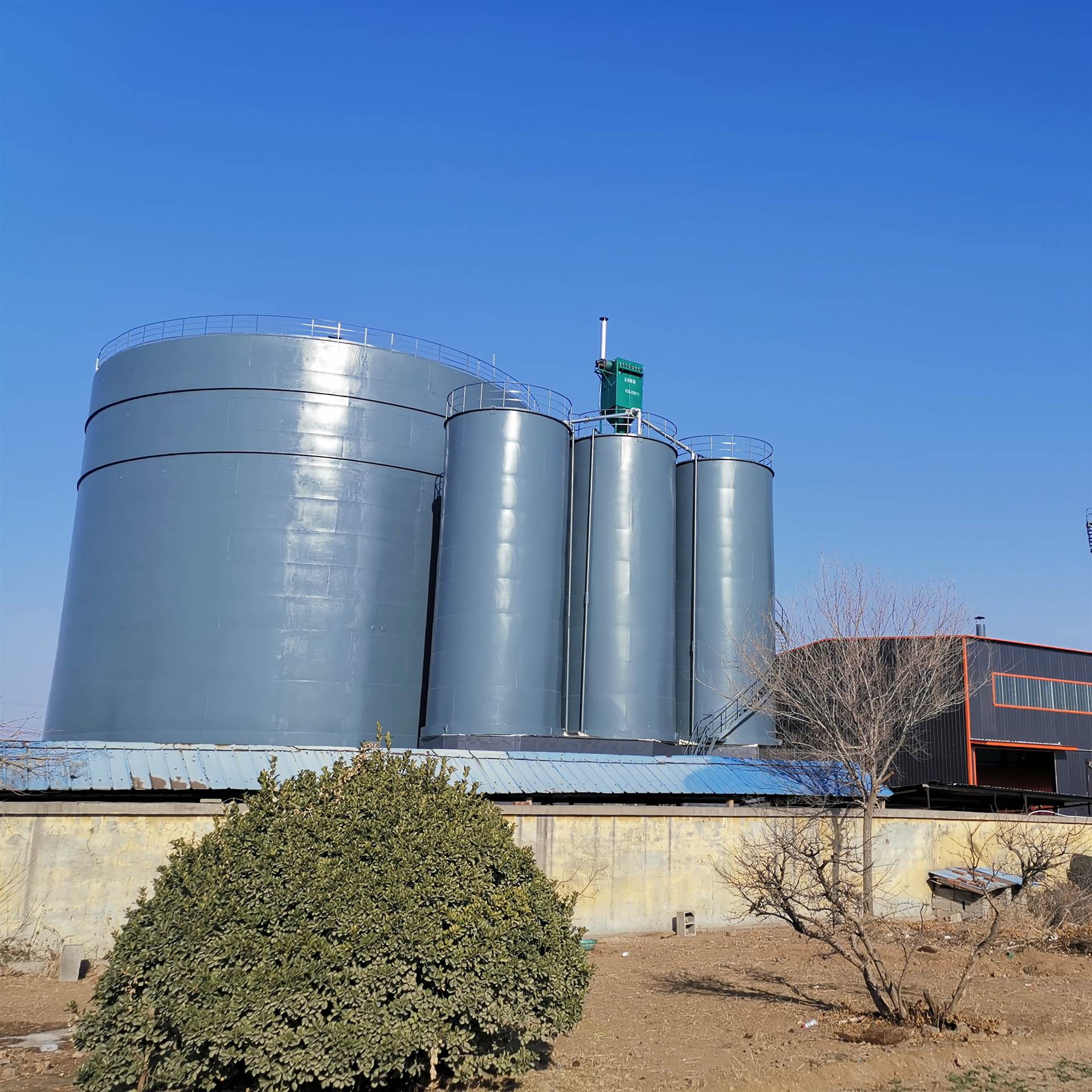 钢板散装仓粉煤灰料仓价格5万立方镀锌钢板库报价