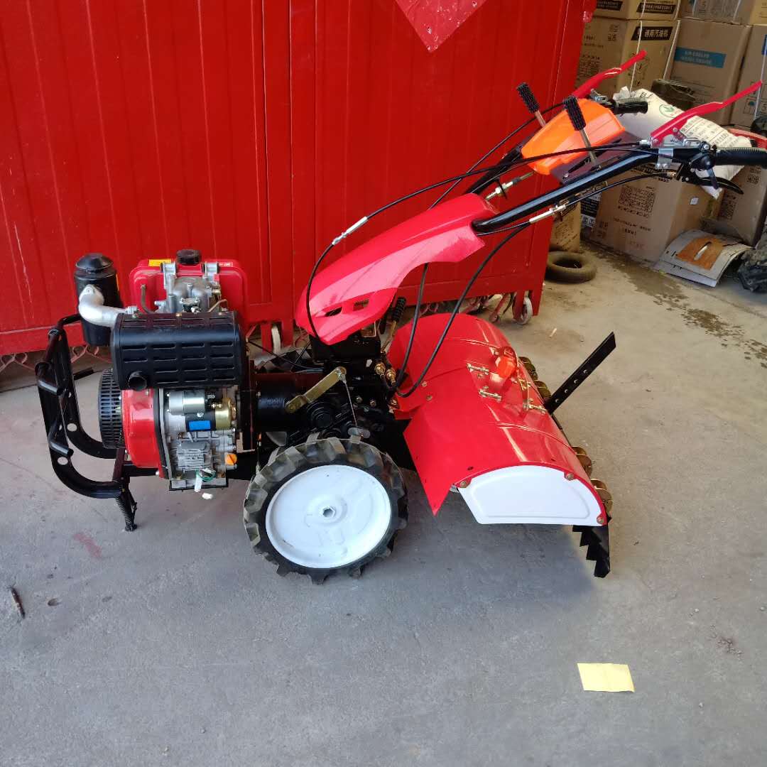 柴油12马力后旋式微耕机手扶式开沟培土机新悦四驱旋耕除草机