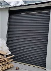 咖啡色彩钢卷闸门_弼塘电动卷帘门_佛山禅城卷闸门厂家