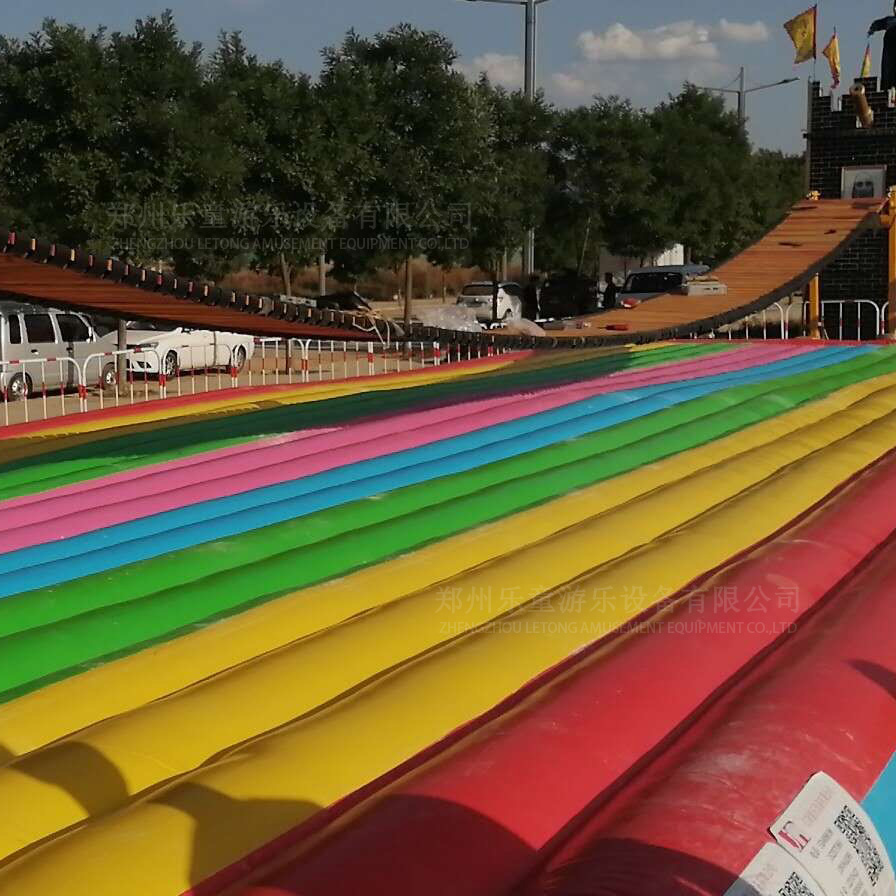 郑州乐童定制庙会用20米气垫网红桥工厂价格指导安装