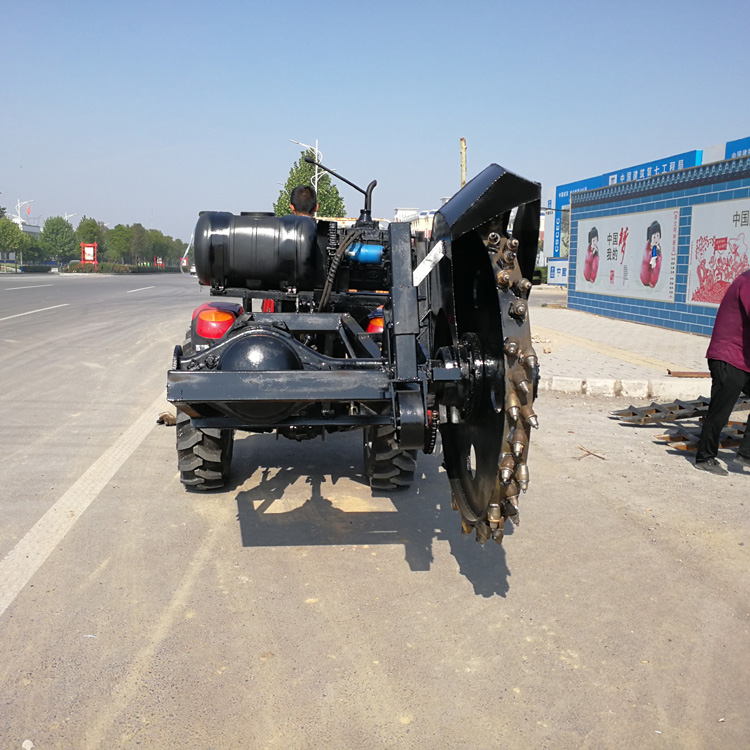 明茂供应 挖排水沟开沟机 乡村路面埋水管开沟机 大型四轮拖拉机牵引