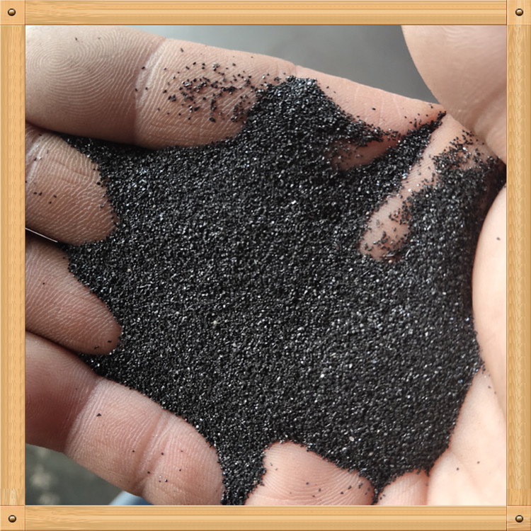 供应20-40-80目喷砂除锈用亮黑金刚砂 亮黑沙子厂家