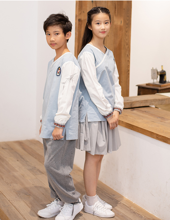 轩洋服饰民族风刺绣校服定制中小学幼儿园表演服厂家屁定制