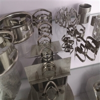    矩鞍环金属填料 304 316带齿环 化工不锈钢散堆填料 冷却塔洗条塔填料