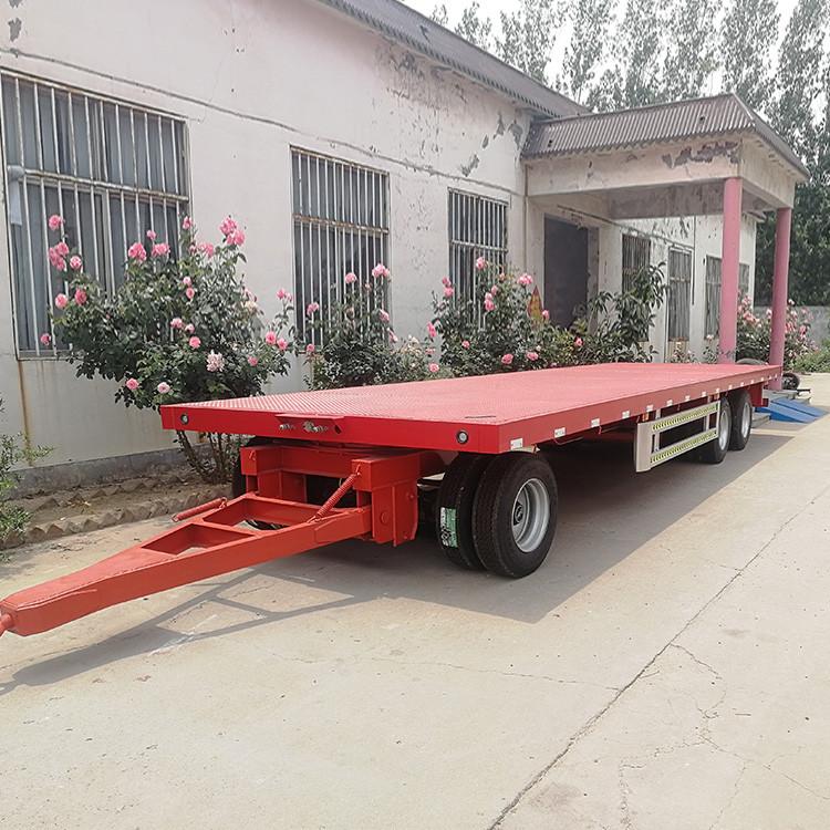 小型平板拖车物流台车运输车重钢平板拖车110吨可定制