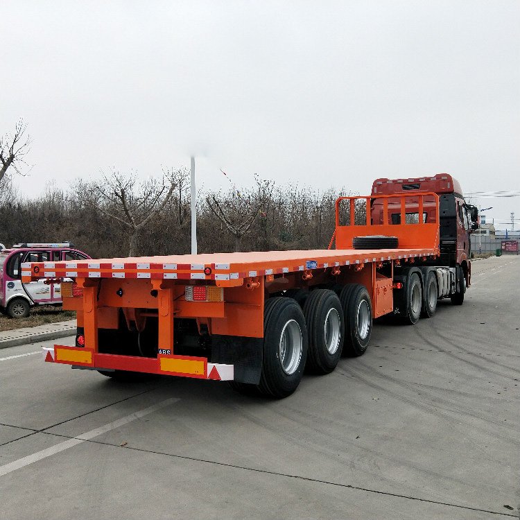 出售平罗县三桥平板运输半挂车13米木制品运输拖挂车出口平板半挂车