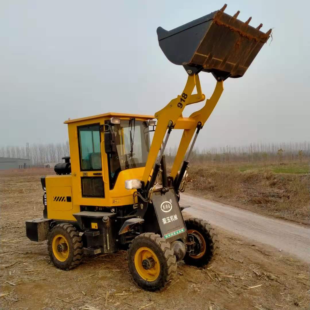 环保四驱电动铲料车小型电动装载机价格小型电动铲车质量三包