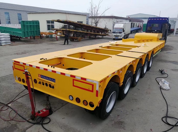 勾机运输低平板半挂车 四线八轴平板车牵引升降