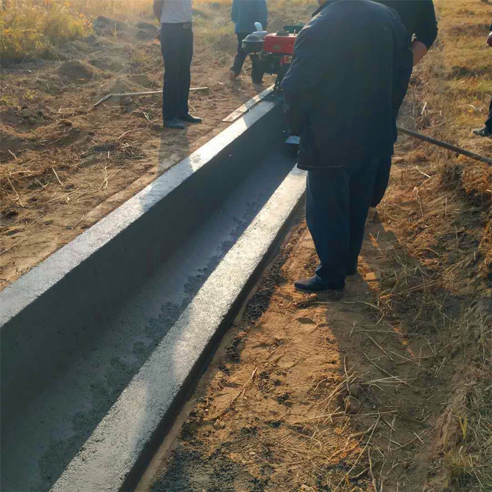 多功能梯形排水沟滑膜机 水泥V型边沟成型机 混凝土蝶形边沟滑膜机