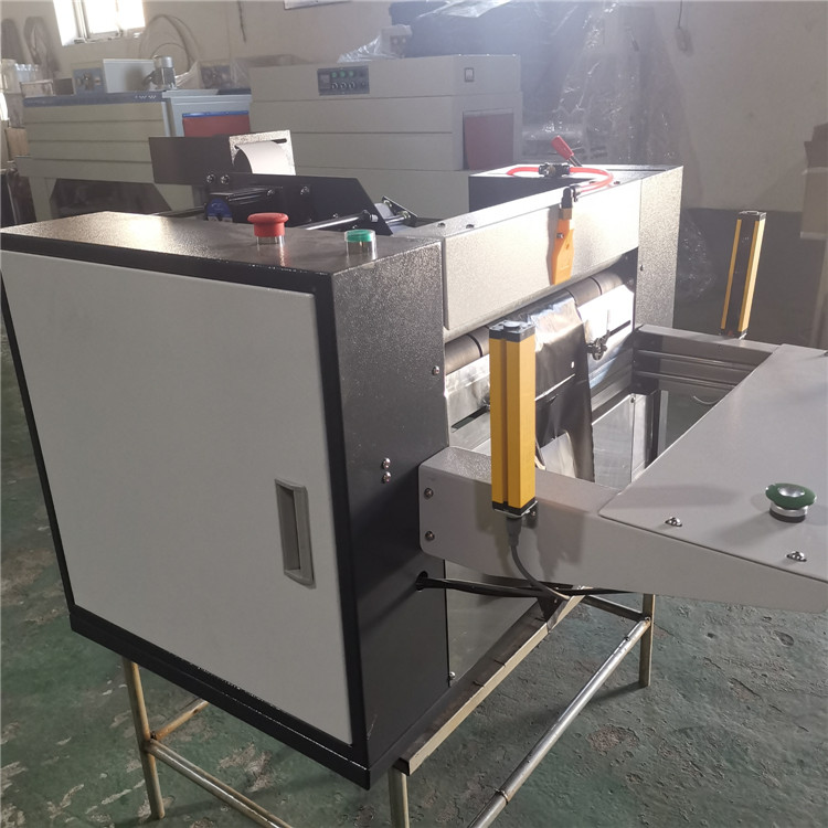 快递包裹打包机pe连卷袋打包机高速套袋封包贴单一体机