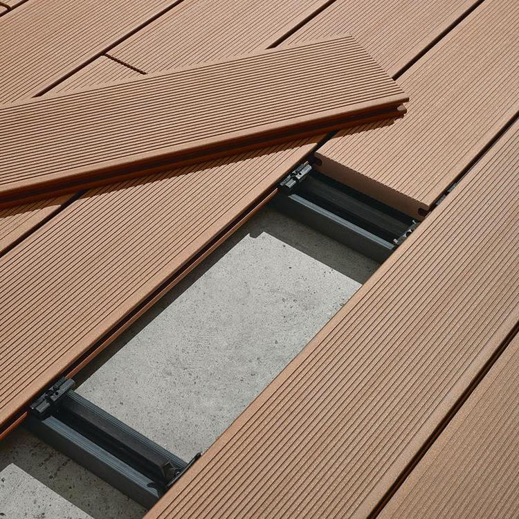 吉林塑木地板露台防腐木塑材料户外木塑圆孔地板pe塑木材料批发