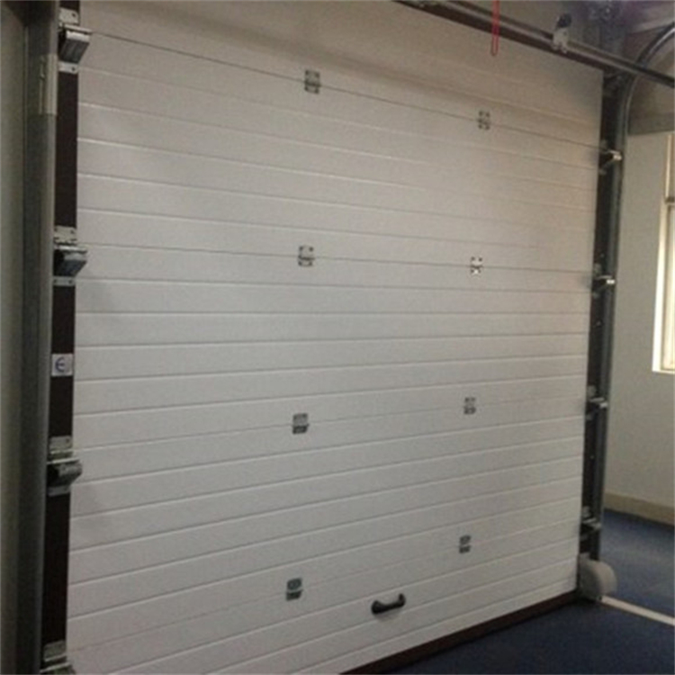 西青区翻板车库门高档自动卷帘门抗腐蚀强运行稳定