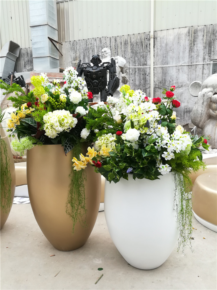 厂家直营玻璃钢花盆雕塑，玻璃钢花瓶模型雕塑厂家