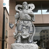 提刀关公石雕人物像  